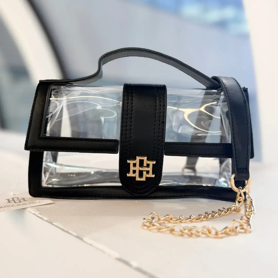 Grace Negra – bolsa transparente con detalles negros y cadena dorada