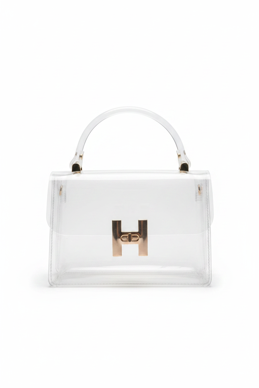 Bolsa transparente cierre H dorado fondo blanco