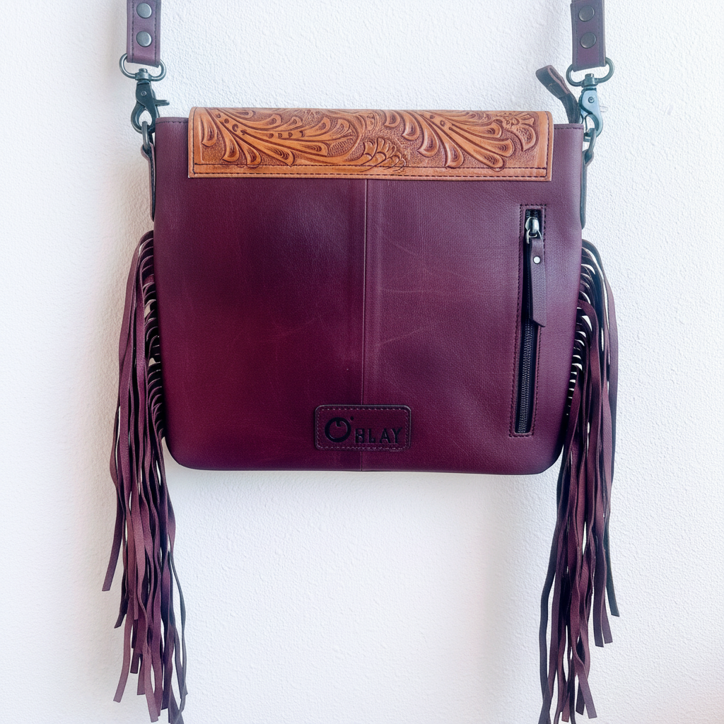 Bolsa crossbody western con flecos en cuero vino – vista exterior